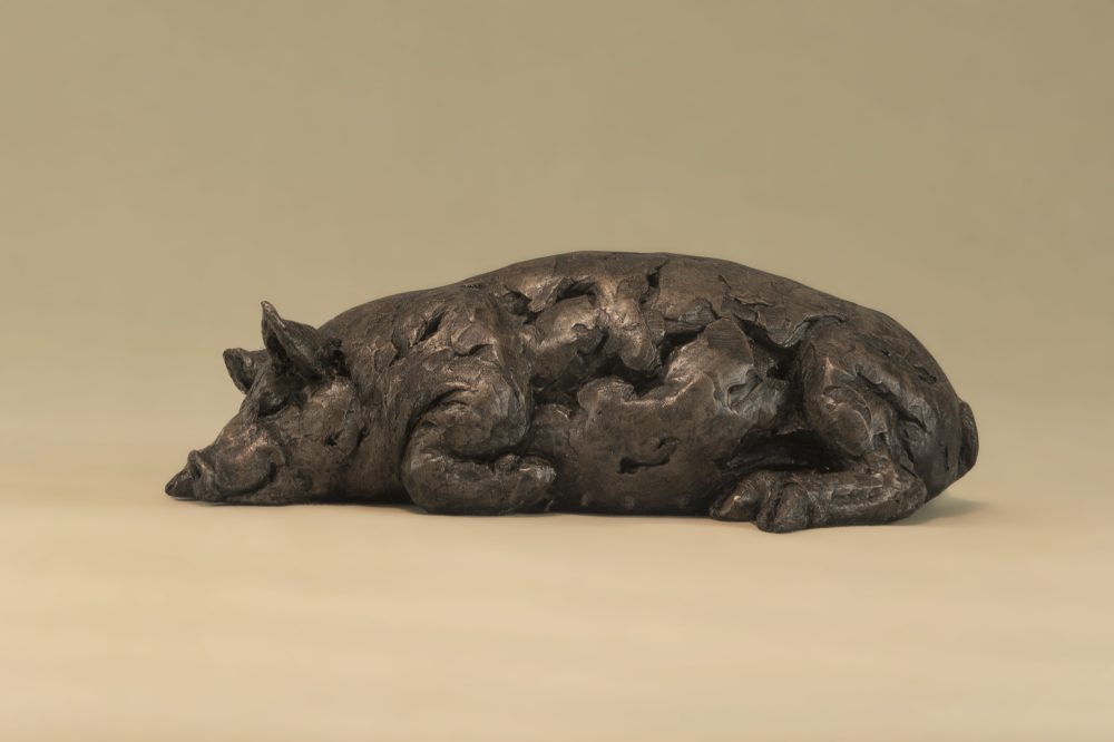 sleeping pig statue