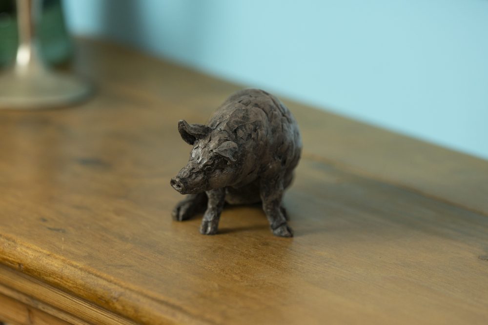 pig ornament in bronze