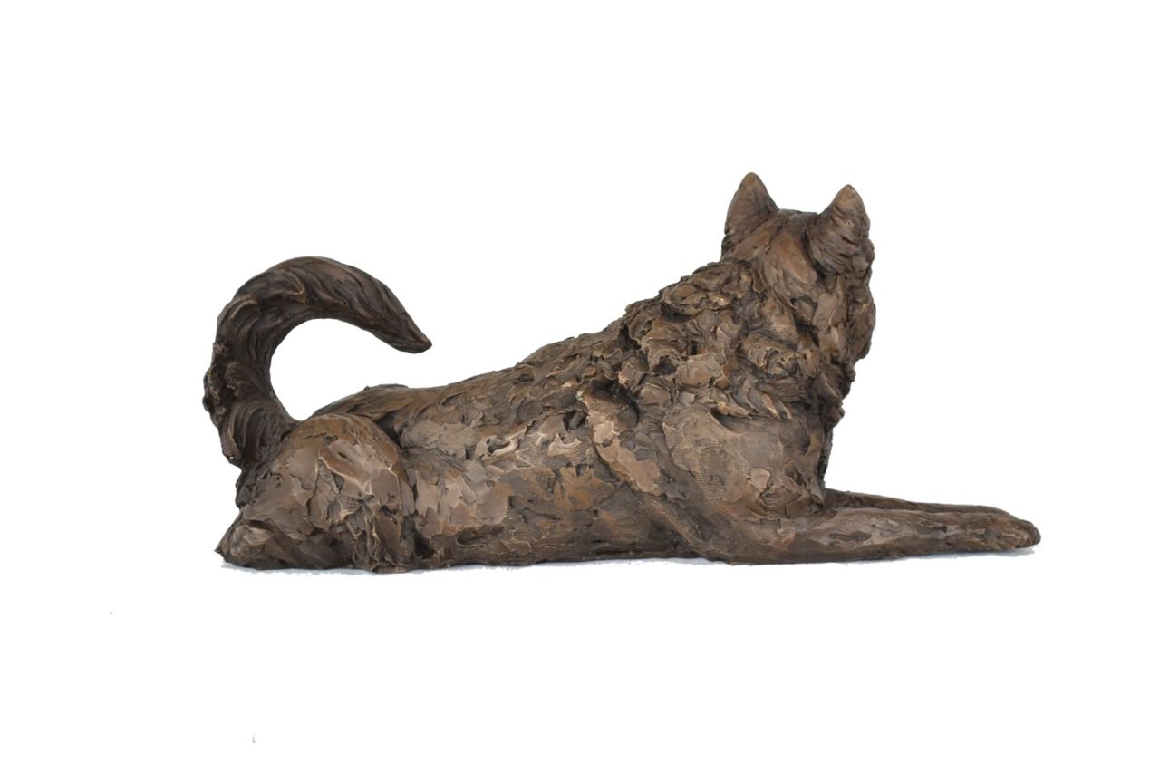 Bronze Lying Malamute sculpture by sculptor Tanya Russell, MRBS