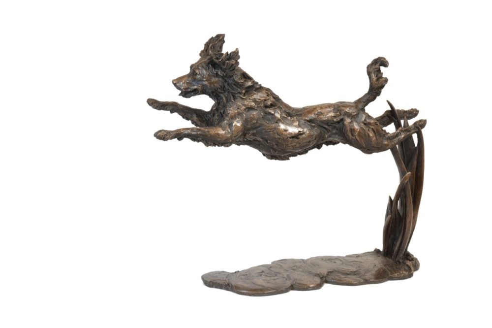 leaping spaniel sculpture