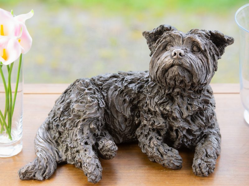 LYING YORKSHIRE TERRIER SCULPTURE