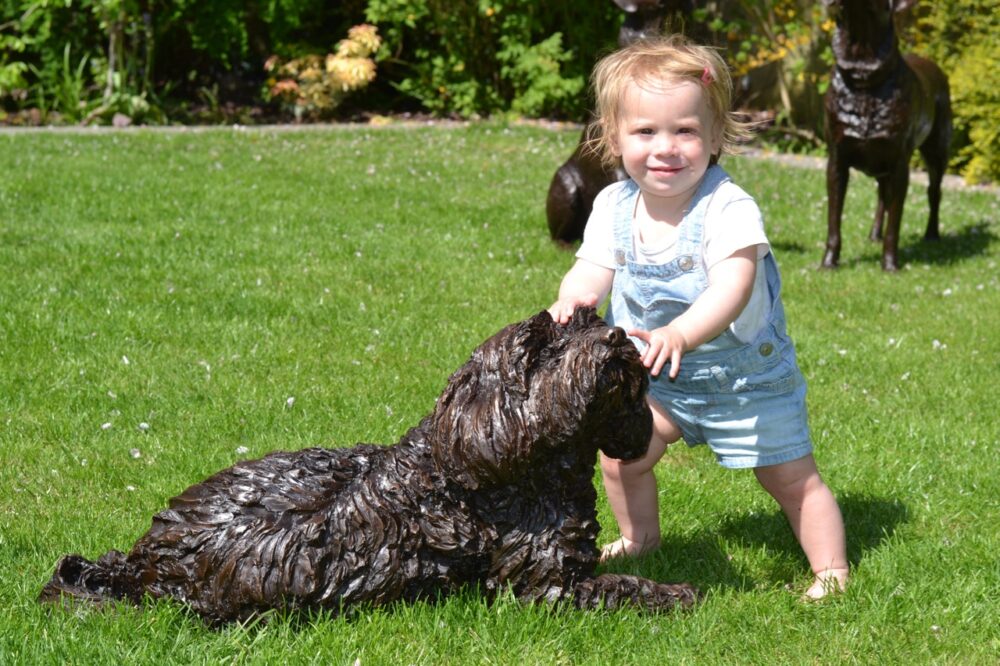 11 Tibetan Terrier and child