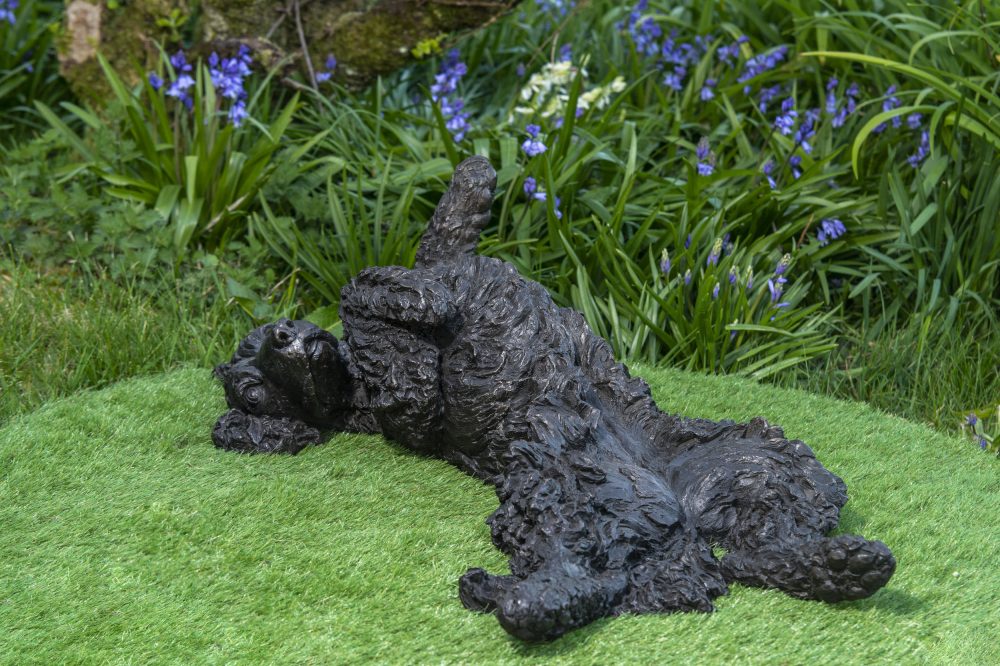 bronze playing spaniel statue