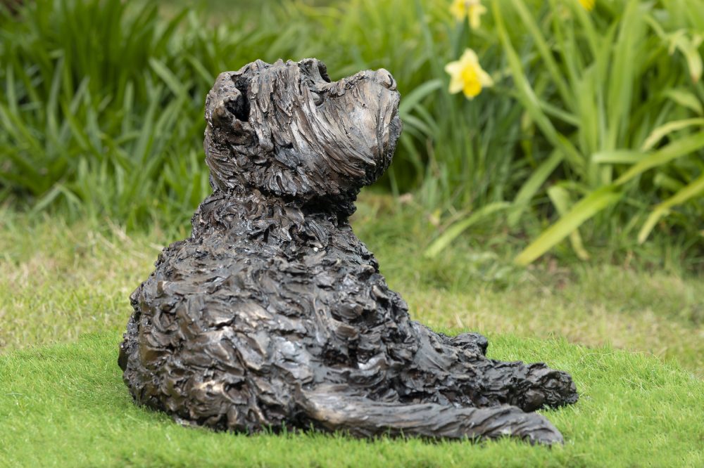 bronze lying yorkshire terrier sculpture