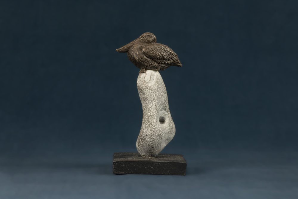 pelican on rock ornament