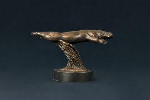 bronze swimming otter statue