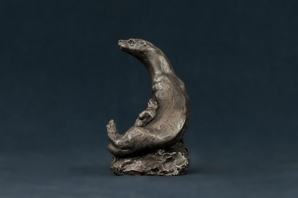bronze otter and cub sculpture