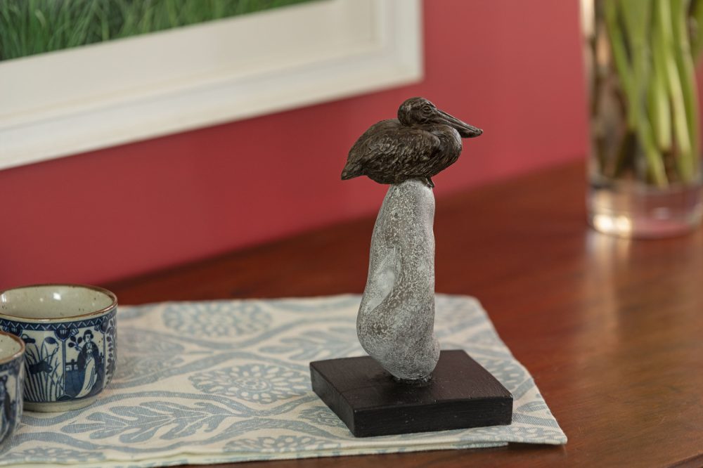 small pelican statue