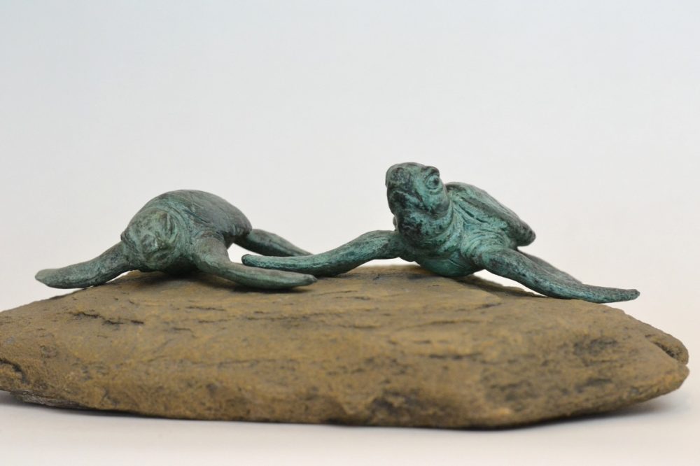 pair of turtles sculpture