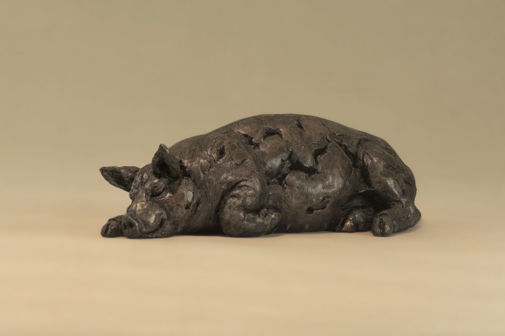 sleeping pig statue