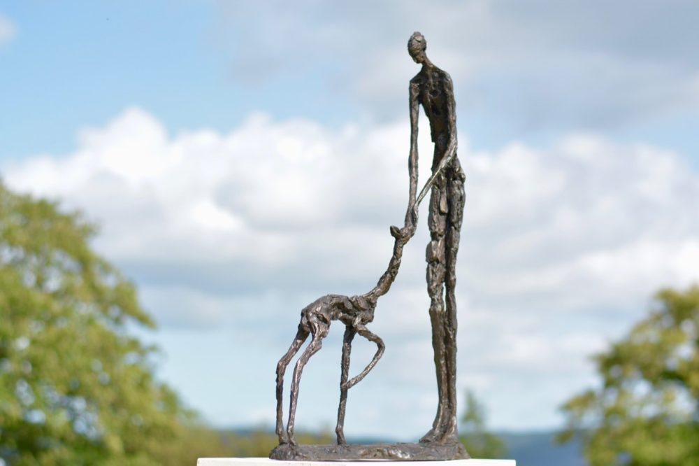 Woman and Fawn Outdoor Statue