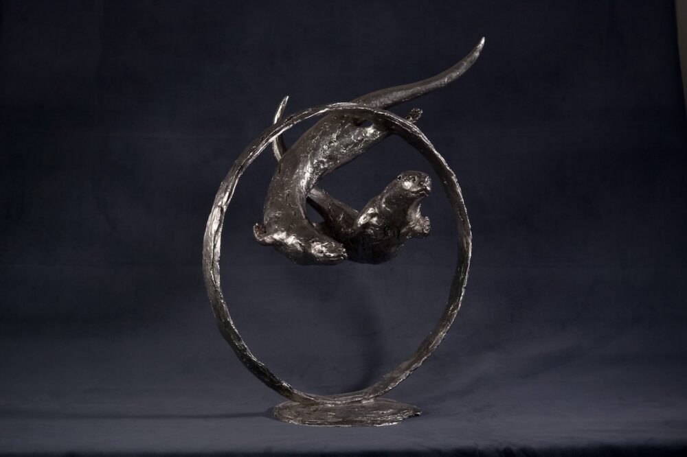 Swimming Otters Statue, Stainless steel otter sculpture, Through Clear Water Statue. Tanya Russell