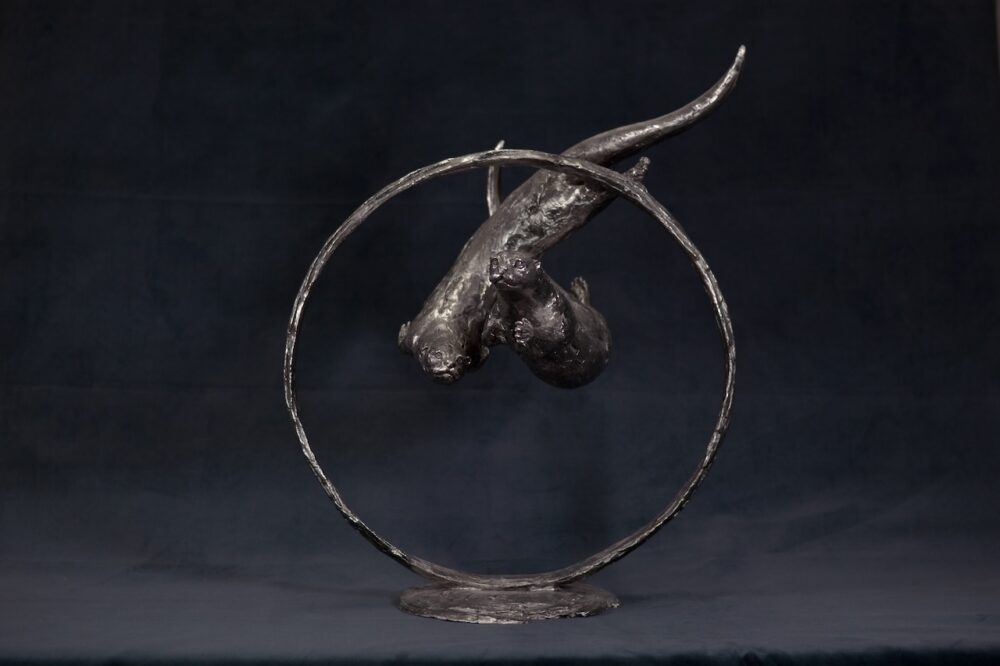 Swimming Otters Statue, Stainless steel otter sculpture, Through Clear Water Statue. Tanya Russell