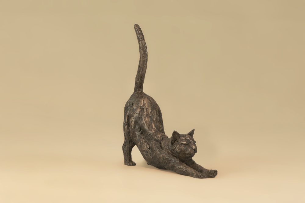 small stretching cat statue