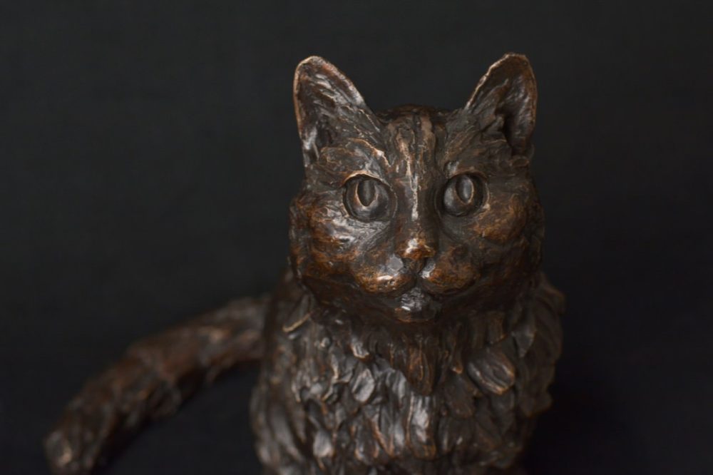 Bronze cat sculpture