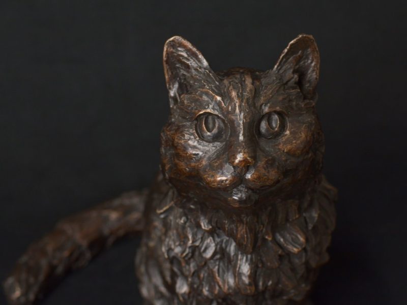 Bronze cat sculpture