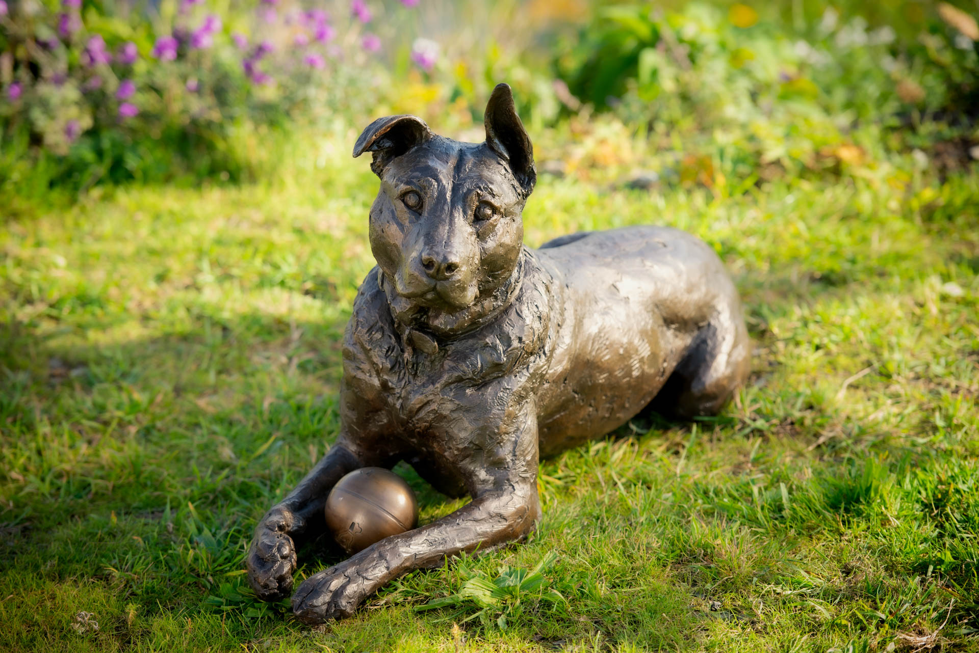 'Stargazers' man and dog on ring sculpture