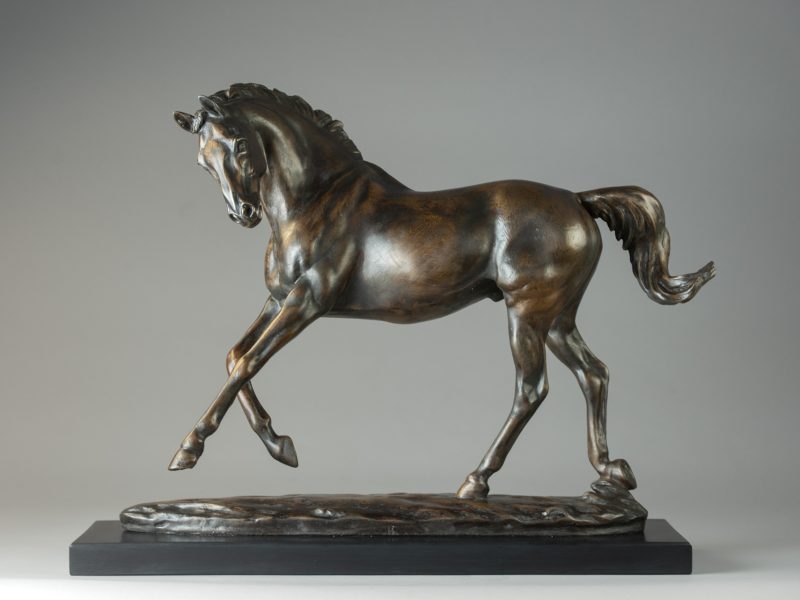 LARGE PLAYING HORSE SCULPTURE