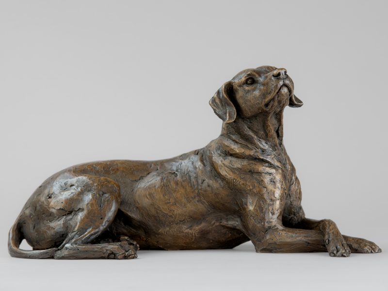 LYING REDBONE HOUND SCULPTURE