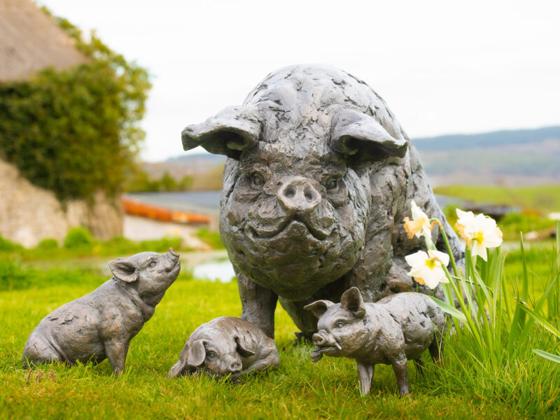 MOTHER PIG AND PIGLETS SCULPTURES