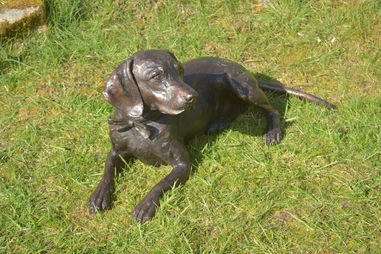 'Stargazers' man and dog on ring sculpture
