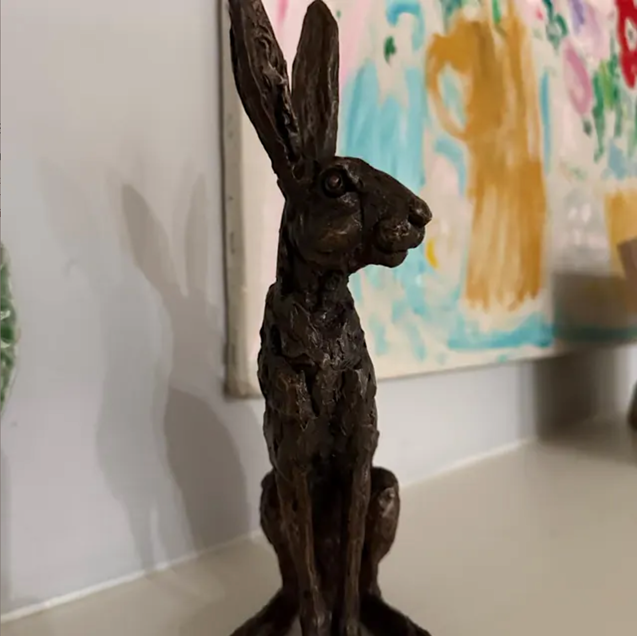 'Stargazers' man and dog on ring sculpture