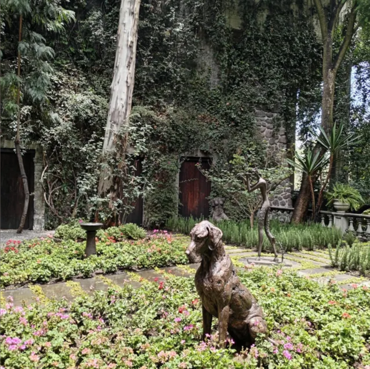 'Stargazers' man and dog on ring sculpture