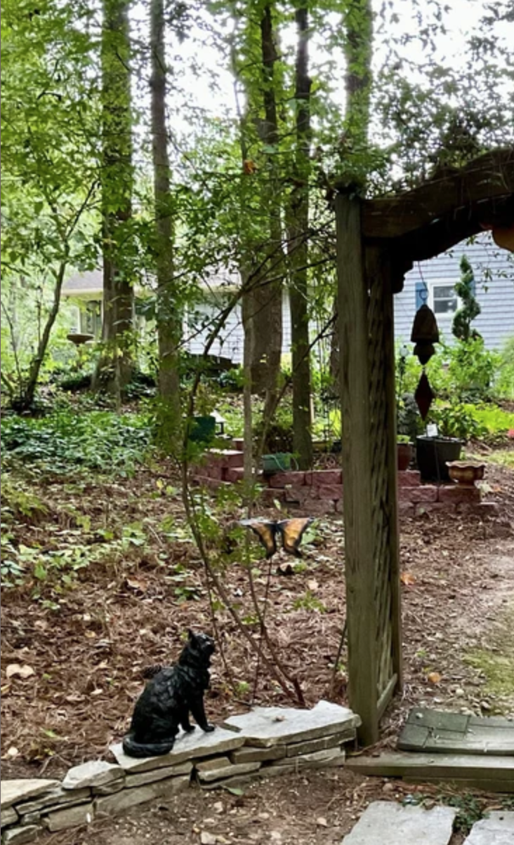 'Stargazers' man and dog on ring sculpture